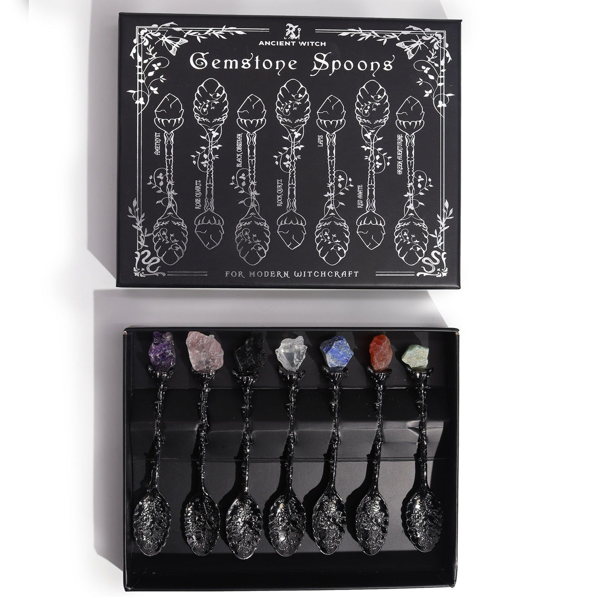 Coffret de sept cuillères à manche argent sombre serties de pierres naturelles