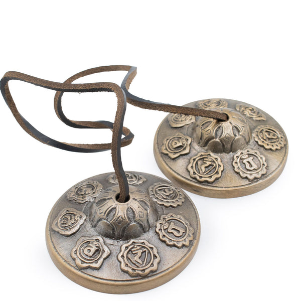 Paire de cymbales tingsha en laiton gravées des sept chakras, 7 cm