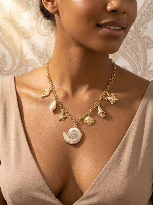 Collier Charms Marins Doré – Étoile de Mer, Tortue & Coquillages en Acier Inoxydable