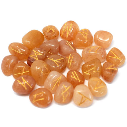 Jeu de 25 runes gravées en aventurine jaune miel, avec leur pochette
