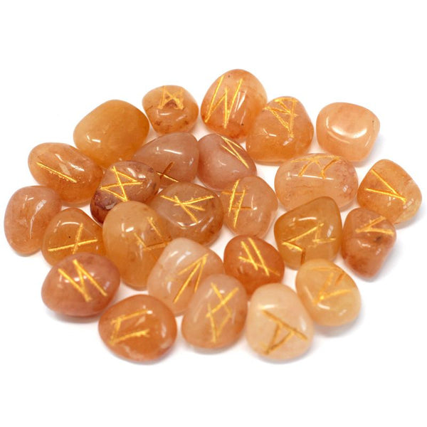 Jeu de 25 runes gravées en aventurine jaune miel, avec leur pochette