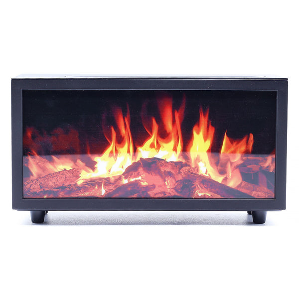Diffuseur en forme de cheminée miniature : caisson noir sur quatre pieds, vitre avant montrant des flammes orangées au-dessus d'un lit de bûches