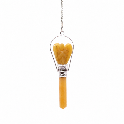Pendule ange taillé dans un quartz jaune, avec sa chaîne argentée et son anneau