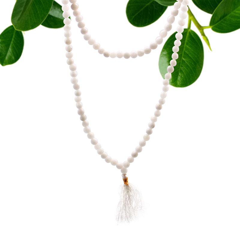 Détail des perles de quartz blanc laiteux