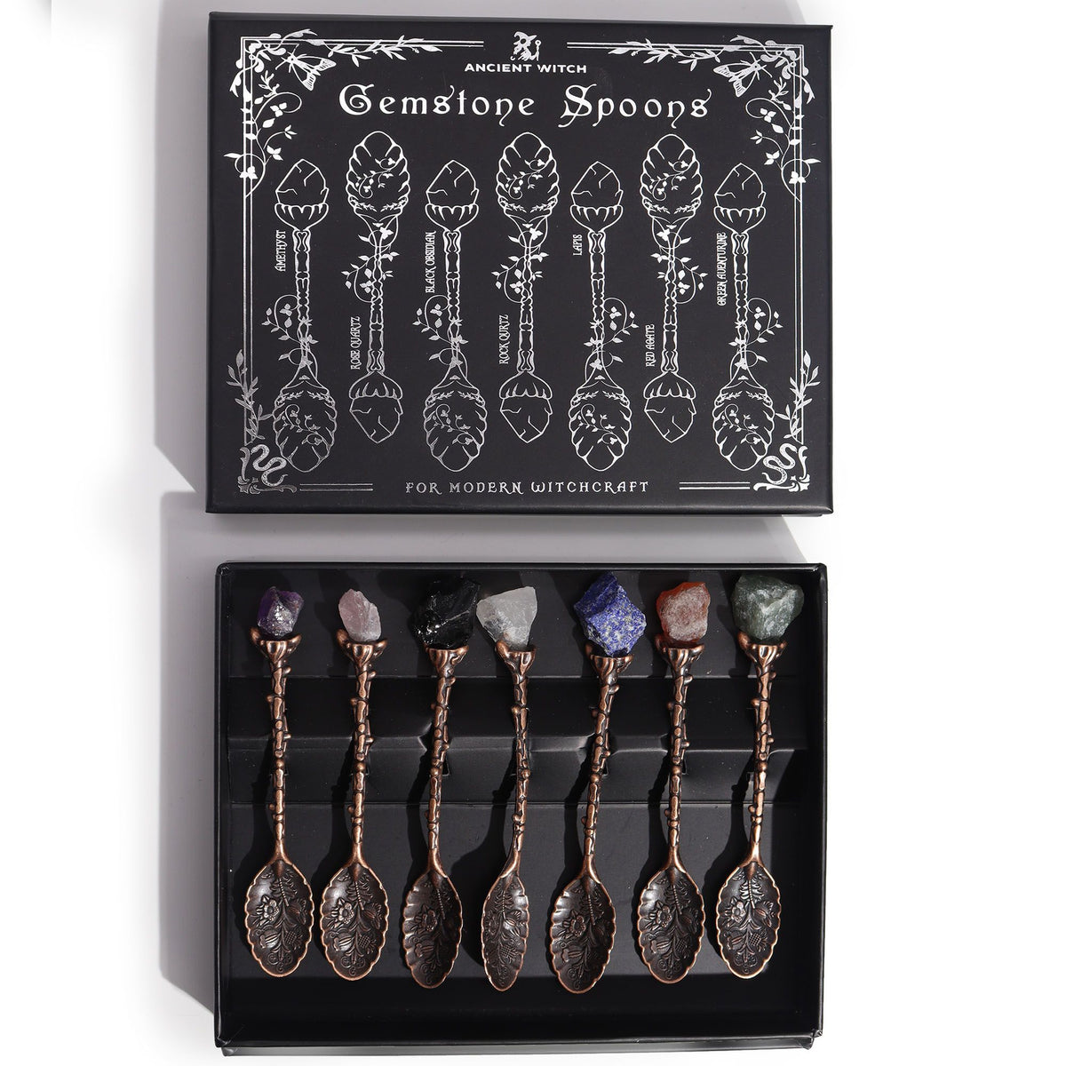 Coffret de sept cuillères à manche bronze serties de pierres naturelles